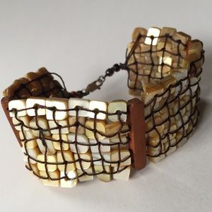 Natural MOP and wood bracelet. Hand knotted.